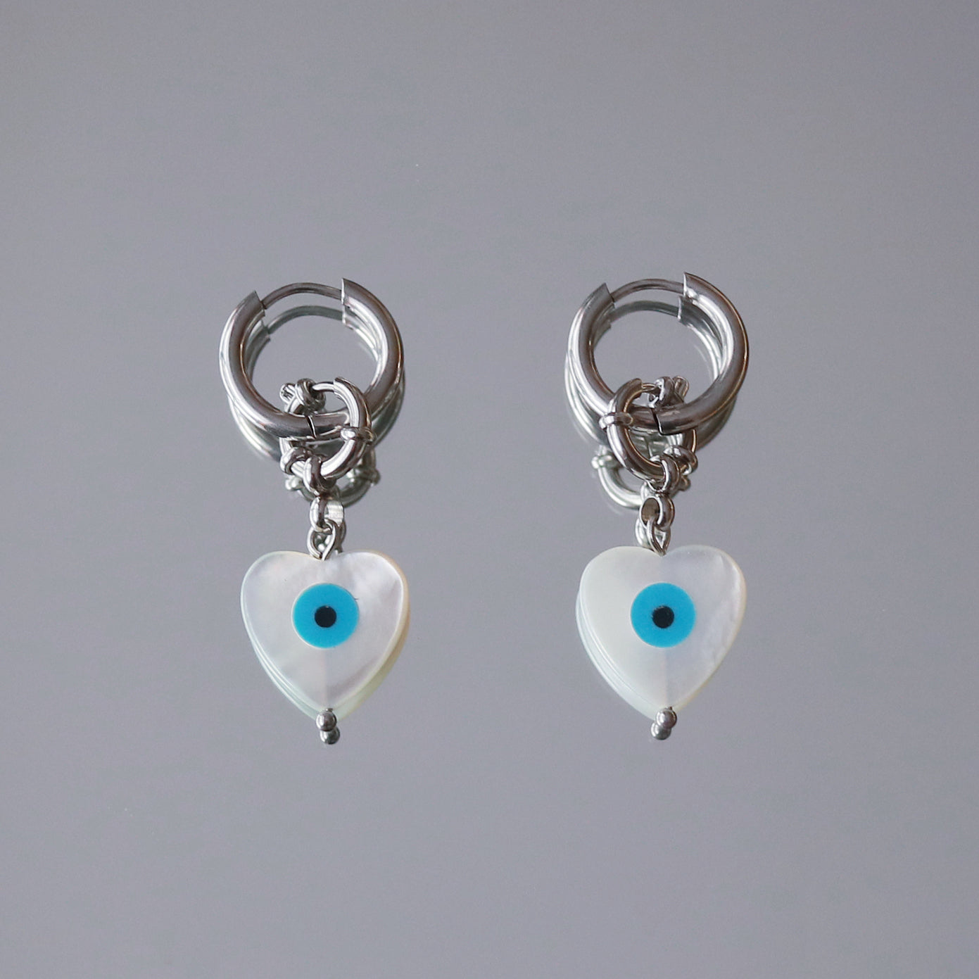 Mother of pearl evil eye earrings